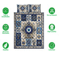 Evil Eye quilt bedding set shown with repeating nazar symbols, floral accents, and feature icons
