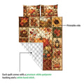 Autumn quilt blanket detail showing the printed harvest side and white diamond-quilted backing