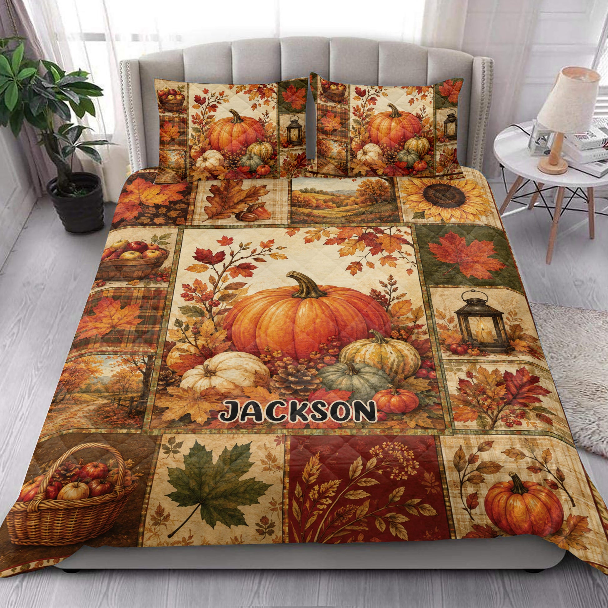 Autumn pumpkin quilt bedding styled in a bright bedroom with warm harvest colors and maple leaf artwork