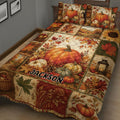 Close view of autumn harvest quilt bedding featuring pumpkins, fall leaves, sunflowers, apples, and lanterns