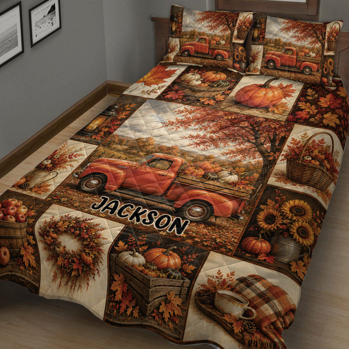 Rustic autumn quilt bedding displayed on a bed with pumpkin harvest scenes, falling leaves, and vintage truck artwork