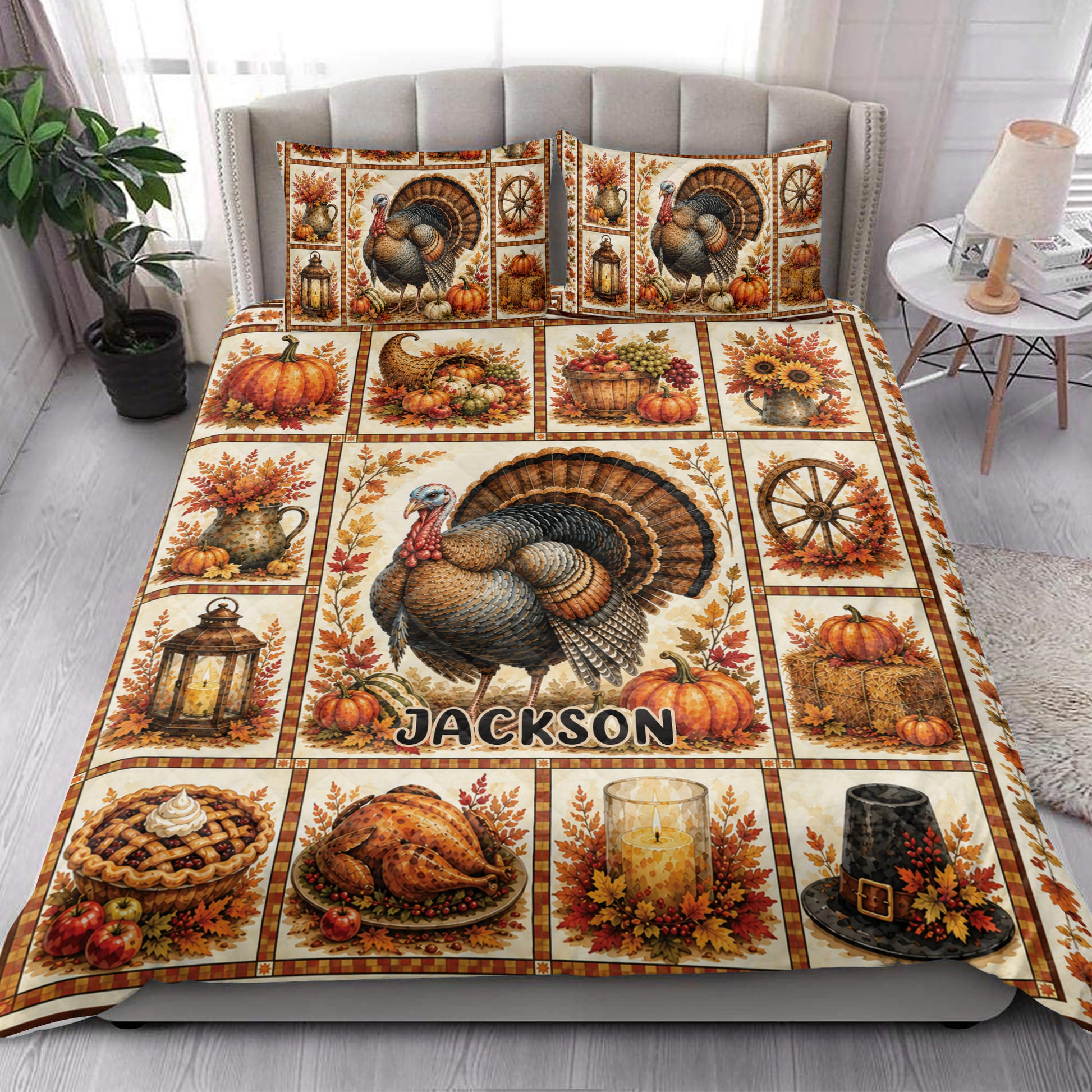 Thanksgiving quilt blanket styled on a bedroom bed with turkey, pumpkin, sunflower, and warm autumn harvest artwork