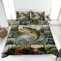 Bass fishing quilt blanket displayed on a bed with lake scenes, fishing gear, and large jumping fish artwork