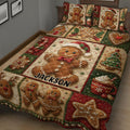 Christmas gingerbread cookie quilt blanket draped across a bed in a cozy bedroom