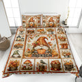 Autumn gnome quilt blanket displayed on a bed with pumpkins, leaves, harvest decor, and pillowcase options