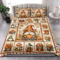 Fall gnome quilt blanket styled on a bedroom bed with pumpkins, leaves, lanterns, and harvest motifs