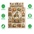 Autumn gnome quilt blanket shown flat with pumpkin, mushroom, cottage, and care feature illustrations
