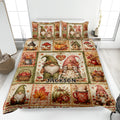 Autumn gnome quilt blanket displayed on a bed with pumpkins, mushrooms, leaves, hearts, and rustic harvest details