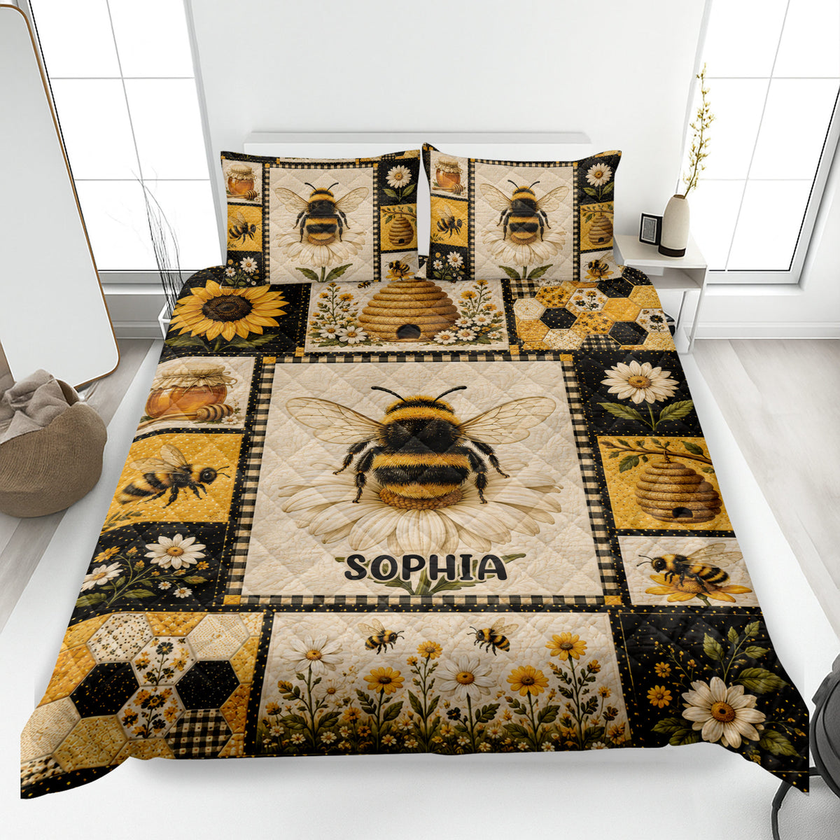 Bee quilt blanket displayed on a bed with honeybees, sunflowers, daisies, honeycomb, and beehive artwork