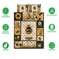 Bee quilt bedding set shown with honeybee, sunflower, daisy, honeycomb, and beehive design details