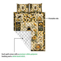 Bee quilt showing its printed floral side and white quilted backing with honeycomb and flower artwork