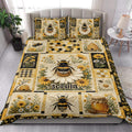Bee quilt blanket styled in a bright bedroom with floral panels, honey jars, beehives, and honeybees