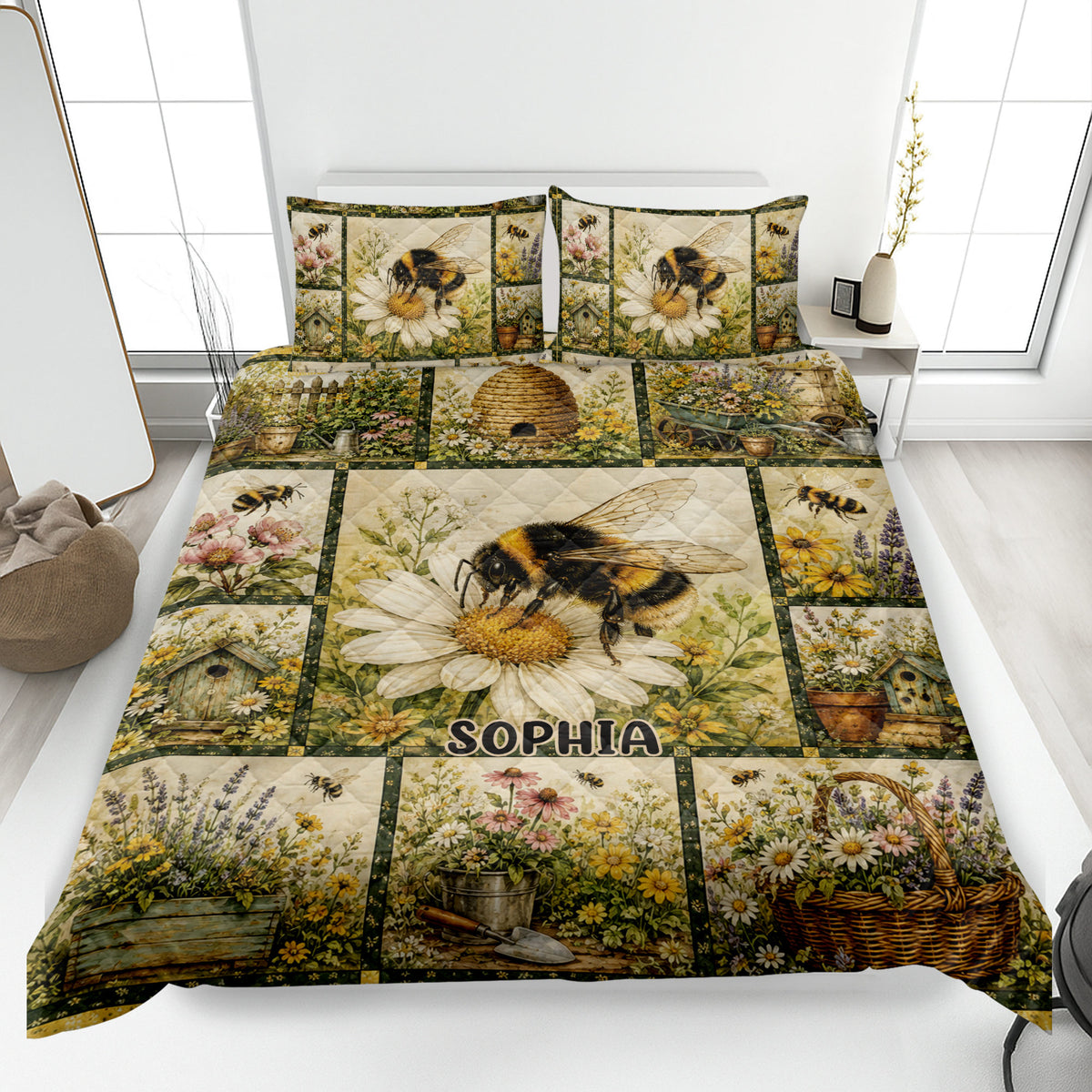 Bee quilt blanket displayed on a bed with floral garden scenes, beehives, birdhouses, and a large pollinator design