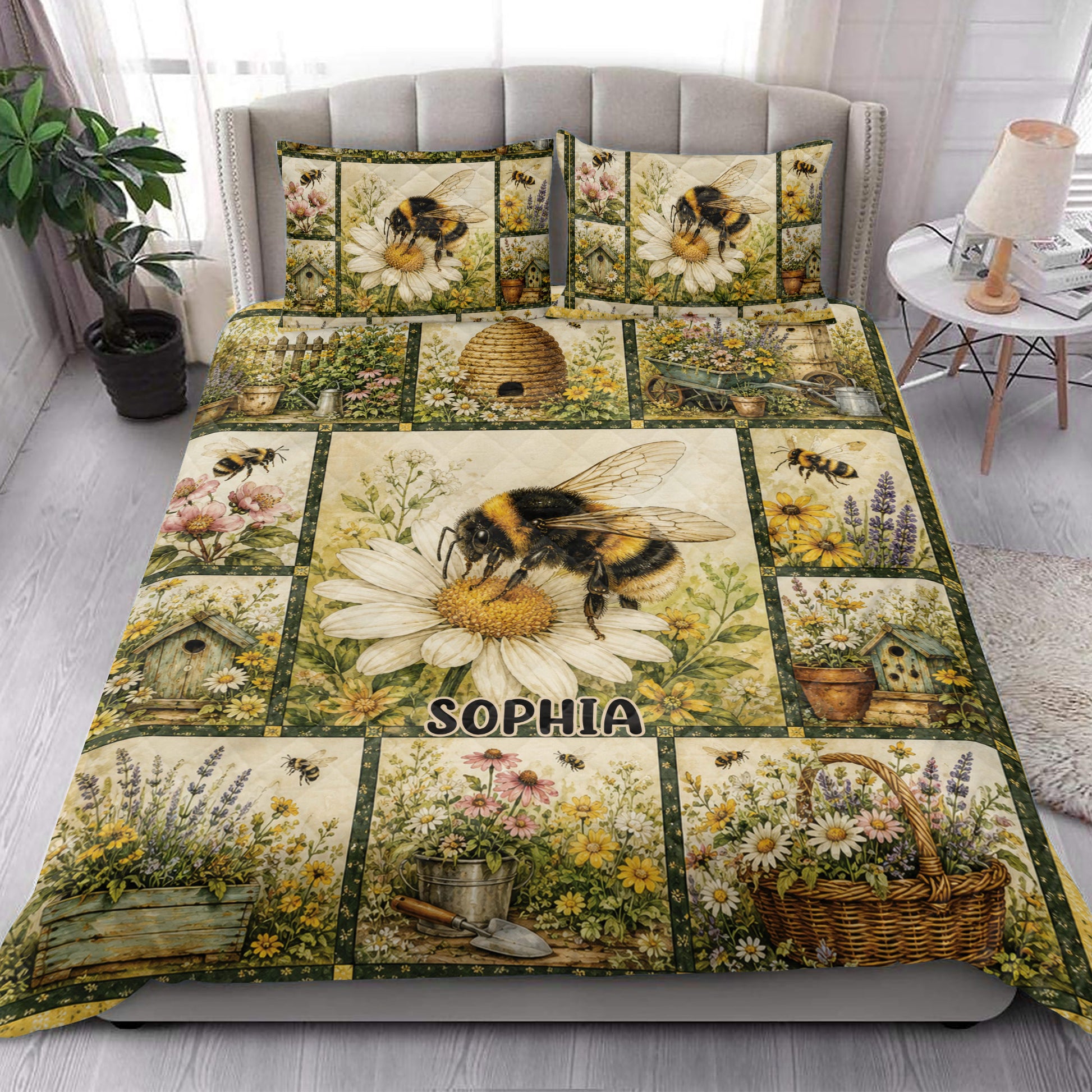 Bee quilt blanket styled in a bright bedroom with floral garden artwork and matching bee pillows