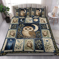 Moonlit owl quilt blanket styled in a bright bedroom with botanical panels and multiple owl illustrations