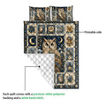 Owl quilt blanket detail showing the printed front, quilted white backing, and illustrated nighttime bird design