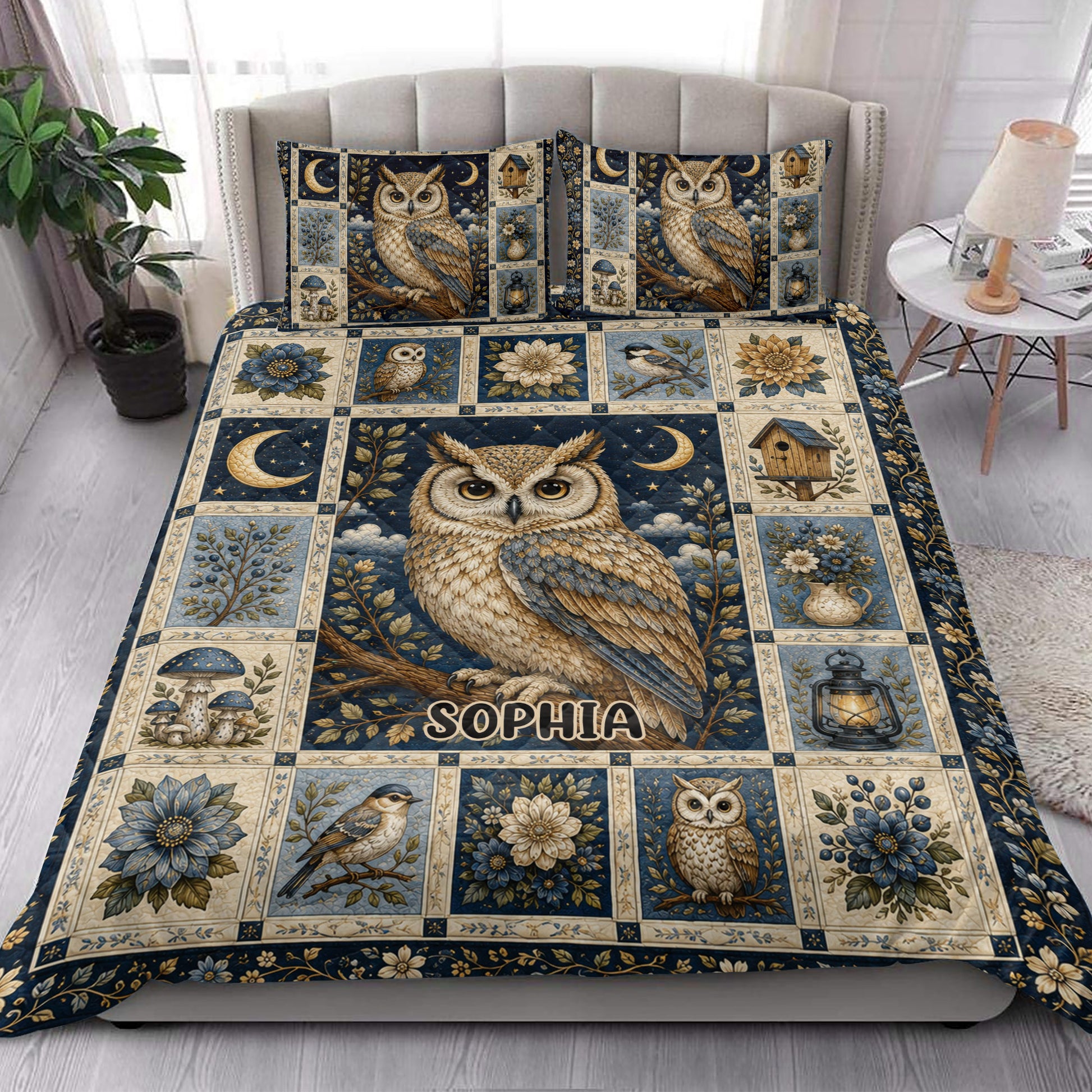 Owl quilt bedding styled in a bright bedroom with large owl artwork, flowers, birds, moons, and botanical panels