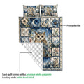 Owl quilt blanket showing the printed front and white quilted backing detail