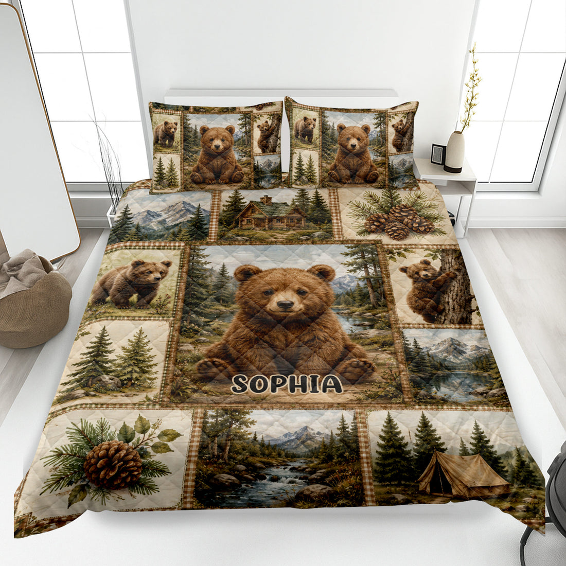 Bear quilt blanket spread on a bed with cubs, mountain scenery, pine trees, a cabin, and camping artwork