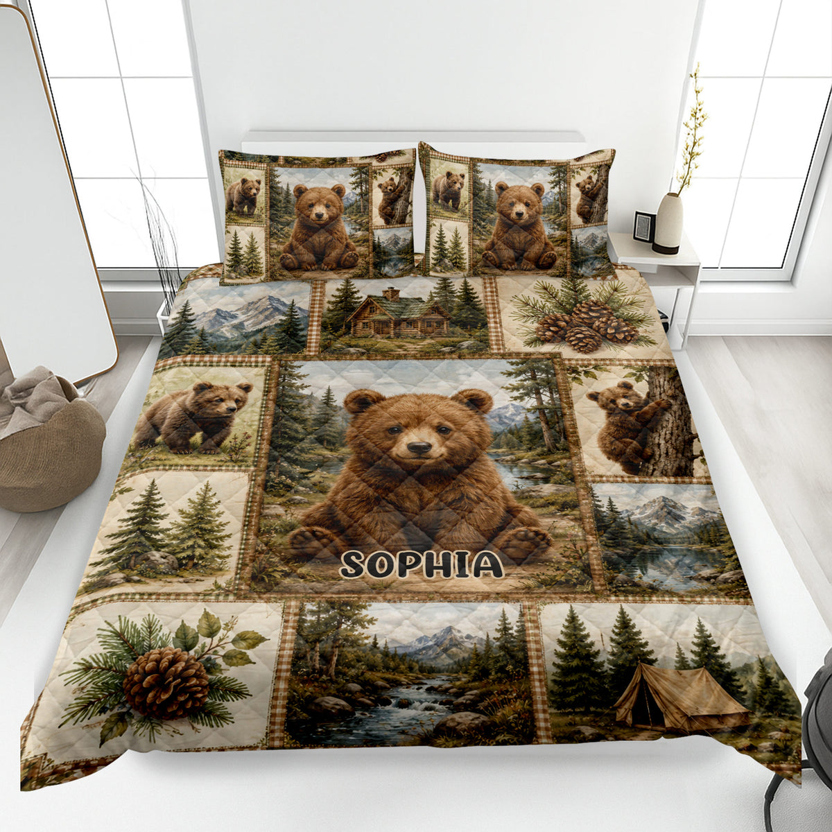 Bear quilt blanket spread on a bed with cubs, mountain scenery, pine trees, a cabin, and camping artwork