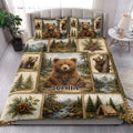 Bear quilt bedding set styled on a bedroom bed with rustic woodland and cabin artwork