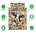 Dairy cow quilt blanket shown with floral farm artwork and soft, breathable, washable care feature icons