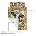 Dairy cow quilt blanket showing its printed floral farm design and white quilted backing