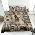 American Bulldog quilt blanket displayed on a bed with paw prints, bones, collars, and bulldog artwork