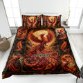 Fiery phoenix quilt bedding set displayed on a bed with dramatic red, orange, gold, and black artwork
