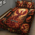 Close angled bedroom view of a black and gold phoenix quilt with vivid flames and ornate borders