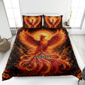Phoenix quilt bedding set displayed on a modern bed with fiery red, orange, and gold artwork