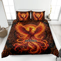 Phoenix quilt bedding set displayed on a bed with fiery orange and red artwork on a black background