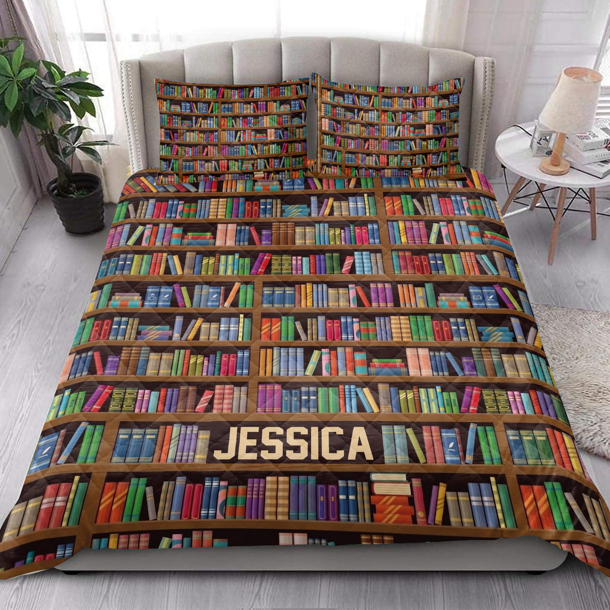 Bookcase quilt blanket styled on a bed in a bright bedroom with matching bookshelf pillow covers
