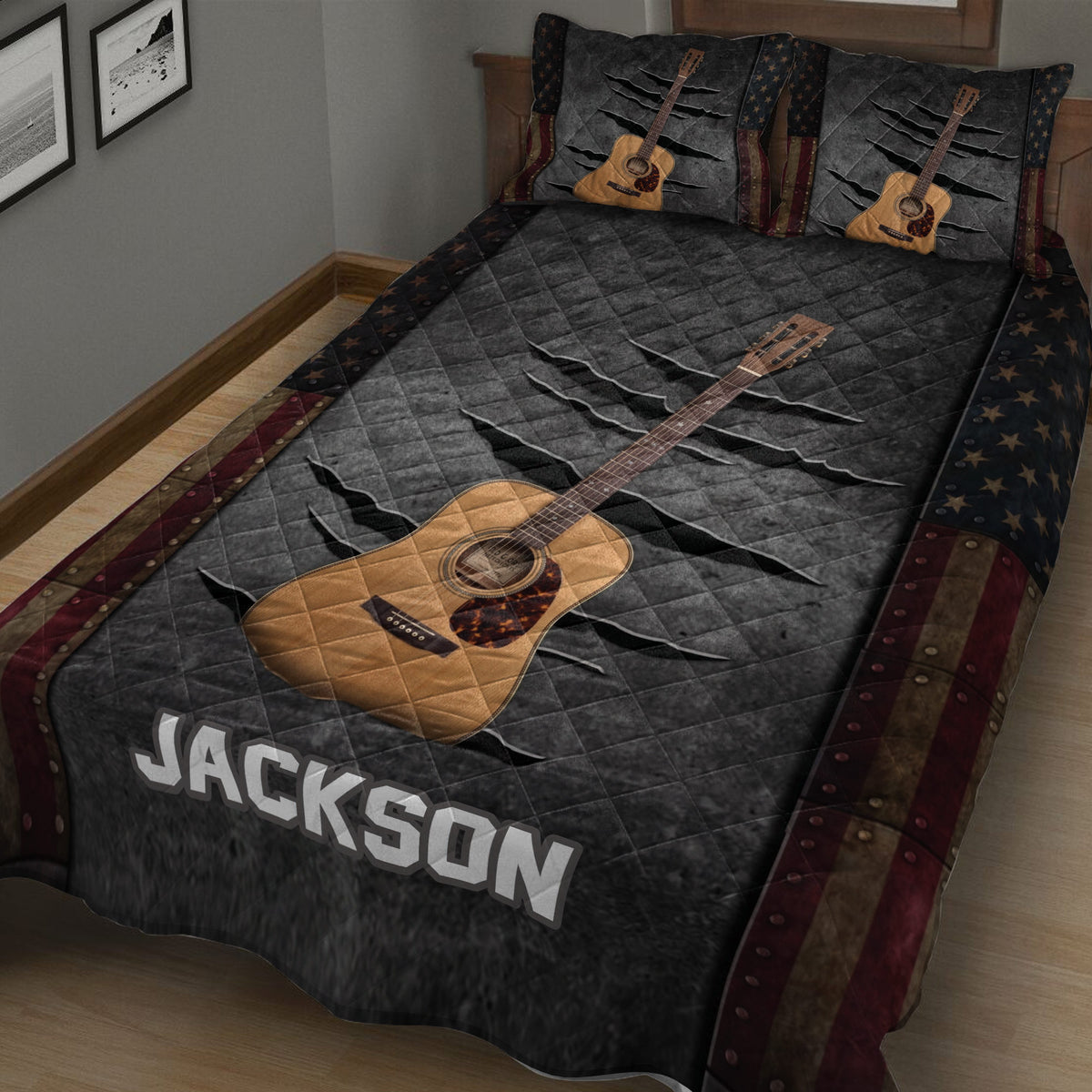 Close bedroom view of an acoustic guitar quilt blanket with dark textured background, stars, stripes, and rustic details