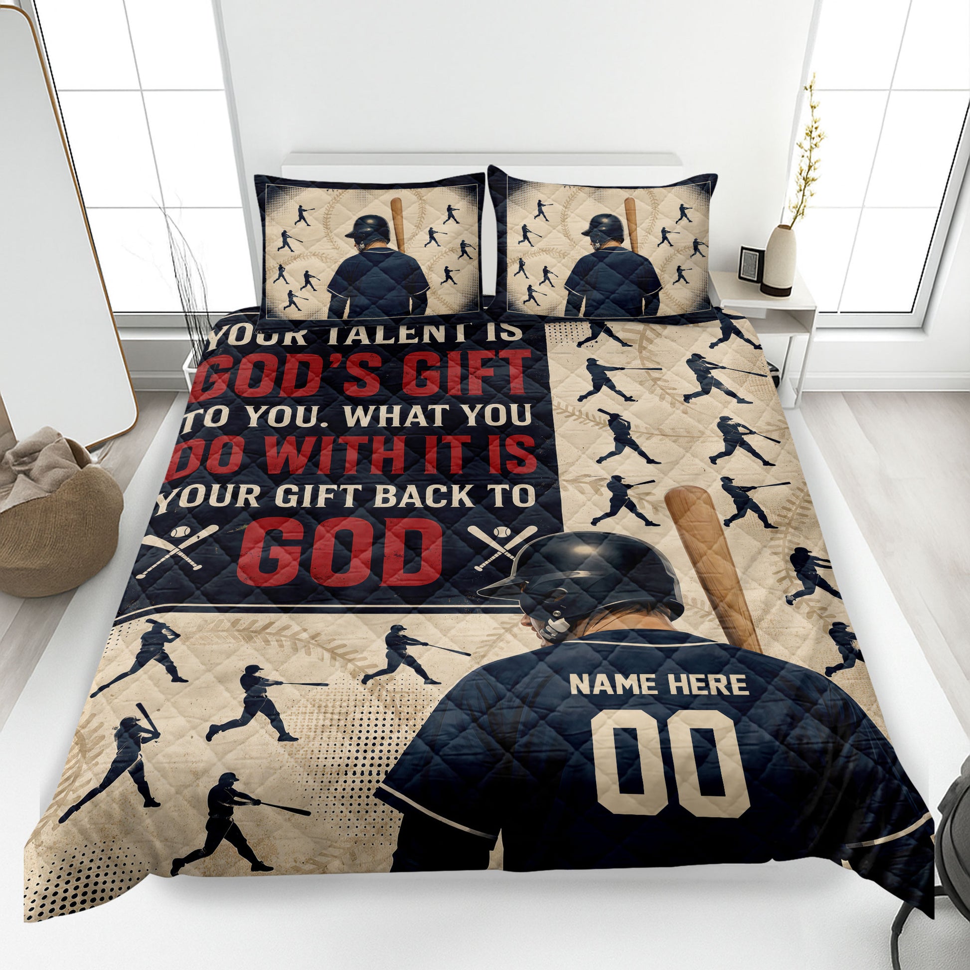 Baseball quilt blanket displayed on a bed with batter silhouettes, bats, baseballs, and navy red artwork