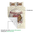 Baseball quilt showing the printed front and white diamond-stitched backing in a construction detail view