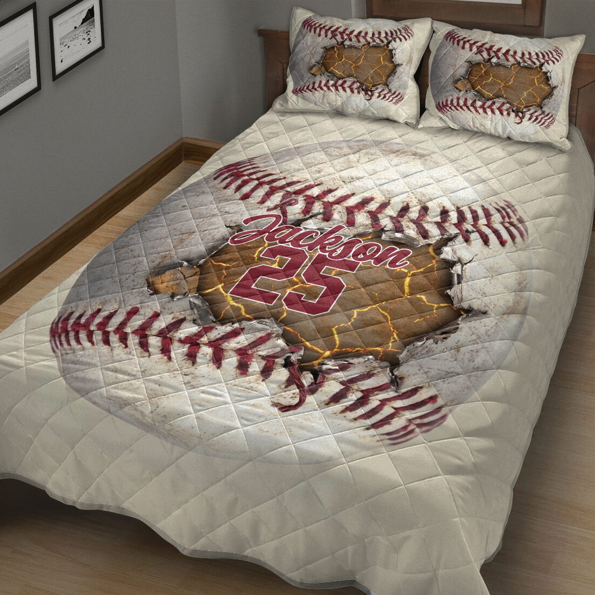 Baseball quilt bedding displayed in a bedroom with bold red stitching and dramatic cracked-ball artwork