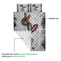 Autism quilt blanket close view showing the printed front and white quilted backing detail