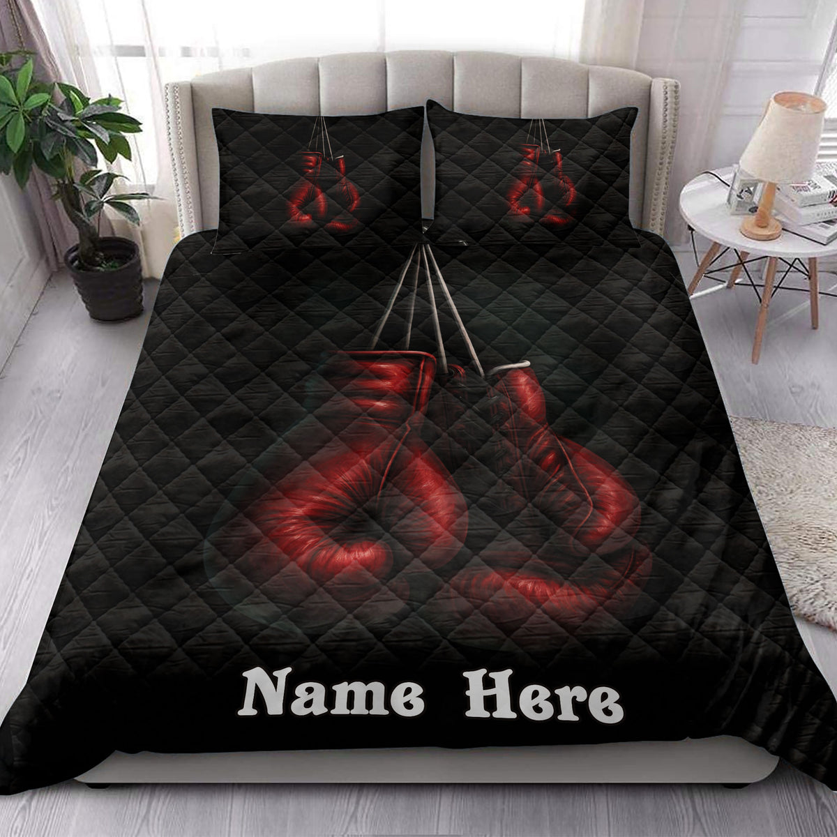 Boxing quilt bedding styled in a bright bedroom with bold red gloves on a black background