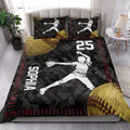 Softball quilt blanket styled in a bedroom with female pitcher artwork, softball graphics, and bold black and red accents