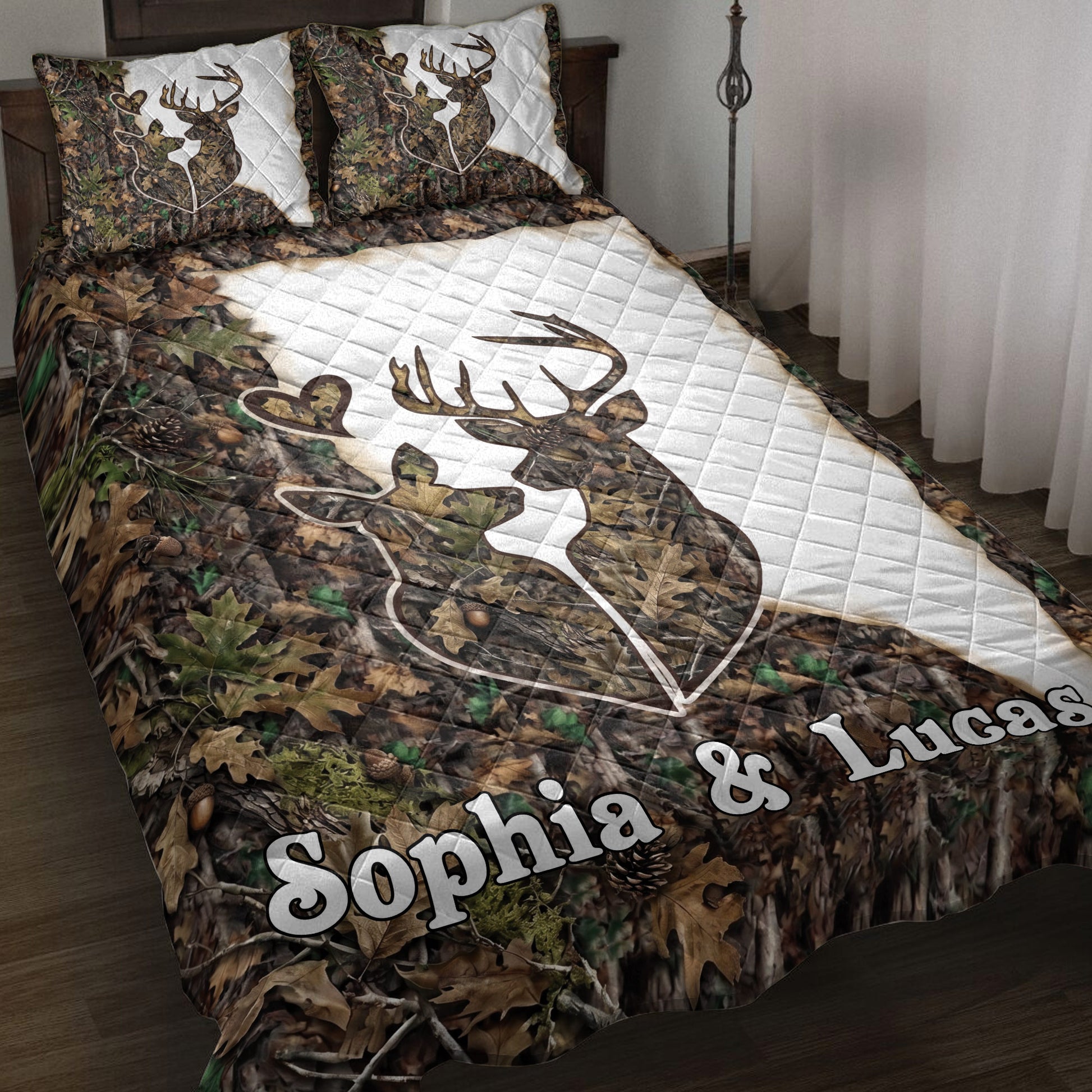 Deer quilt blanket displayed on a bed with woodland camouflage, leafy artwork, and white quilted accents