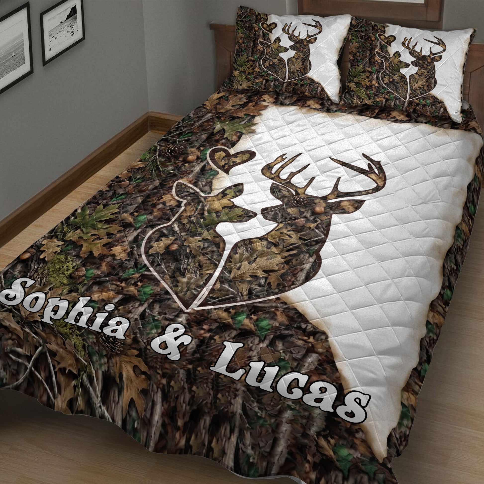 Close bedroom view of a deer quilt blanket featuring antlers, forest foliage, and camouflage artwork