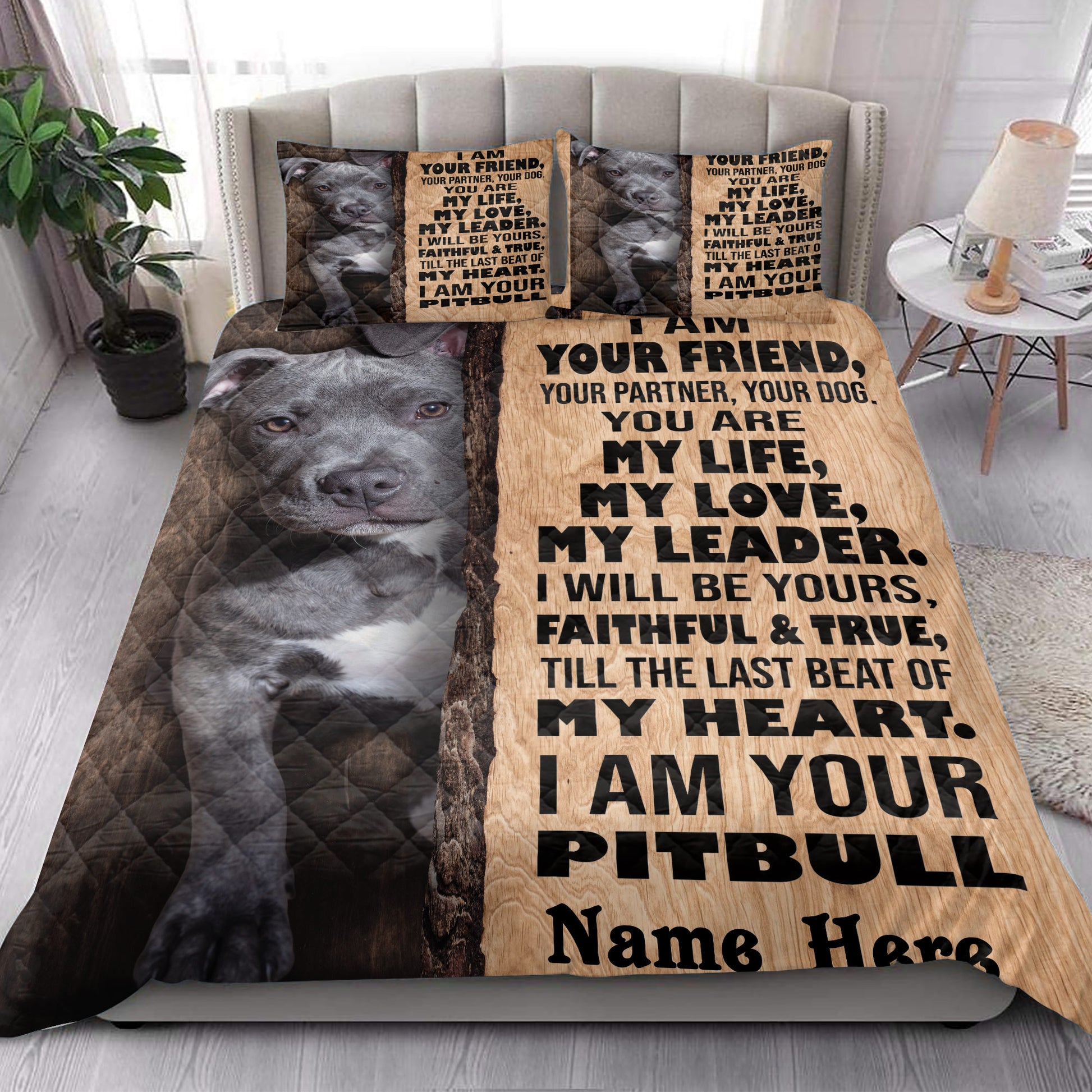 American Staffordshire dog quilt bedding styled in a bright bedroom with portrait artwork