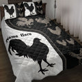 Black and white chicken quilt blanket displayed on a bed with rooster artwork and matching chicken pillows