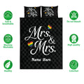 LGBTQ+ Mrs. and Mrs. quilt bedding set shown front-facing with black diamond quilting and rainbow hearts