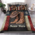 Cowboy quilt blanket styled in a bright bedroom with western boots, hat, stars, and rustic Americana colors