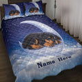 Rottweiler puppy quilt blanket displayed on a bed with a moonlit starry blue design