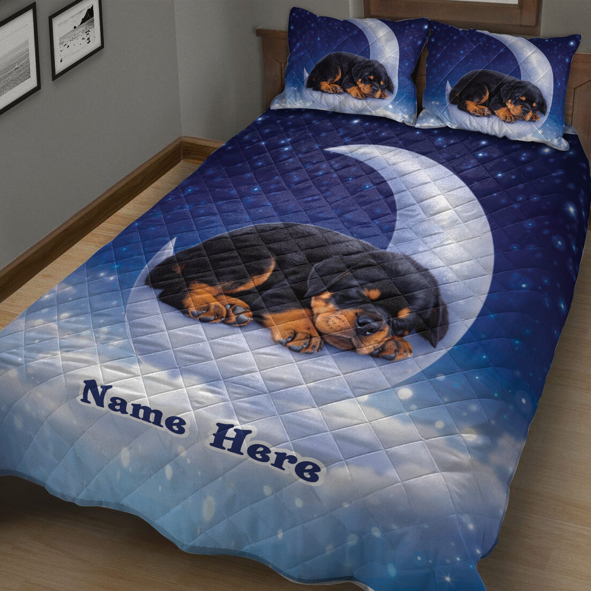 Close bedroom view of a Rottweiler puppy quilt blanket with blue moonlit star artwork