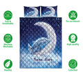 Dolphin quilt bedding set shown with soft breathable and machine washable feature icons