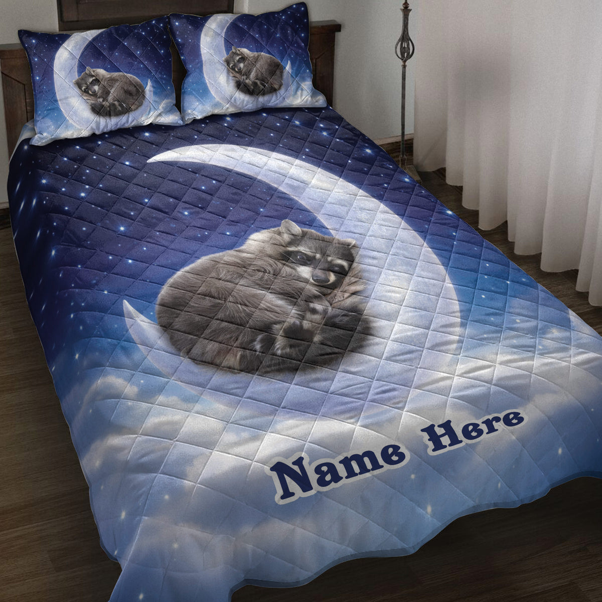 Raccoon quilt blanket spread on a bed with a starry blue night sky, moon, and raccoon artwork